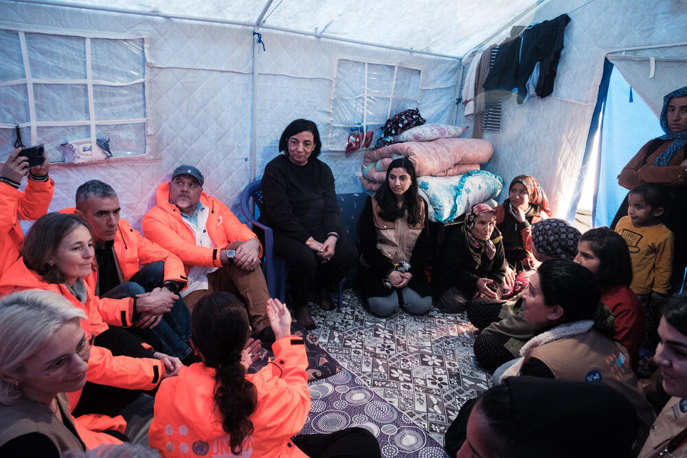 Florence Bauer visits a tent.