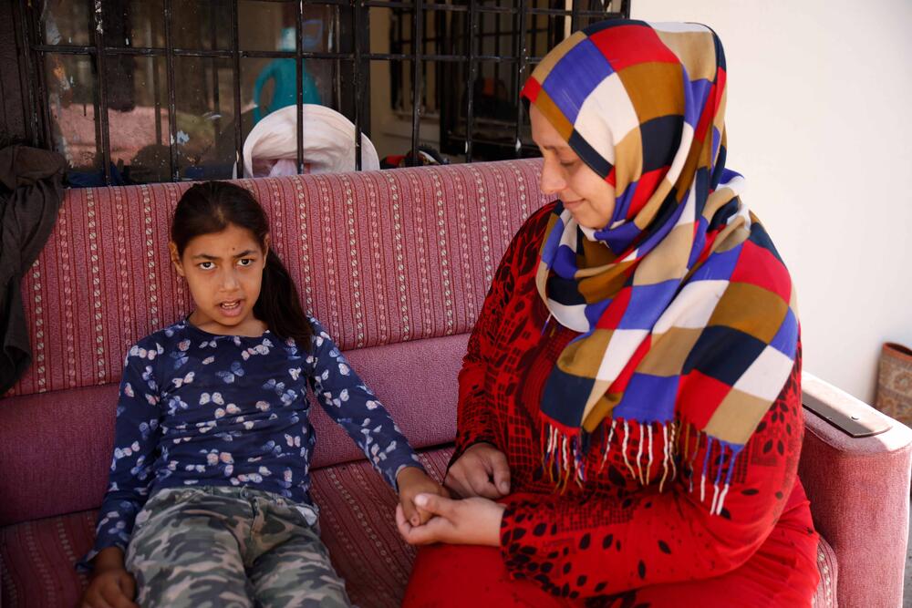 Seniye and her daughter with disabilities. 