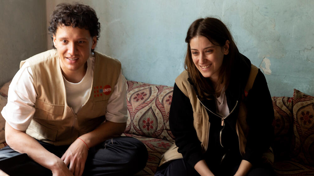 UNFPA Türkiye Honorary Ambassadors Edis & Hazal Kaya appear in the homes of earthquake survivors sitting on the sofa and smiling