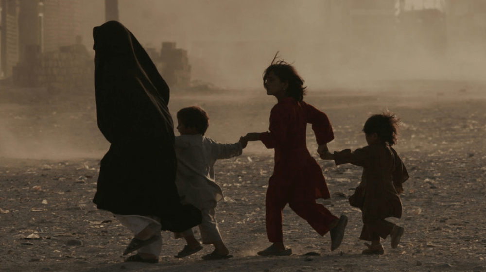 A refugee family fleeing conflict. 